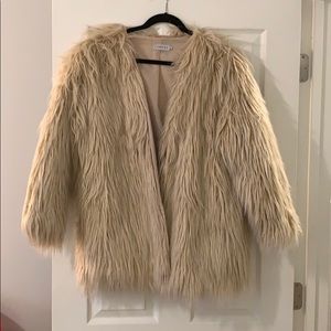 Blush faux fur coat